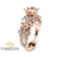 For impeccable style, you simply cannot go wrong with this 14K rose gold Morganite engagement ring from Camellia Jewelry. Hand-forged in stunning detail, the mounting resembles a flower deco as it elevates the floral accents and sparkling pink morganite stone in luminous detail. Dainty diamond accents add a measure of glamour to complete the design. Whether worn as a promise ring or an engagement ring, this unique morganite ring symbolizes an everlasting love that will only ripen with age. Th... Wedding Rings, Engagement Rings, Tiara, Morganite Engagement, Unique Engagement Rings, Diamond Engagement, Wedding Jewelry, Beautiful Rings, Pretty Rings