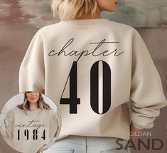"Classic 1984 Sweatshirts For Women, Vintage 40th Birthday Year Number Sweater For Him, Cute 40th Milestone Best Friend 40 Bday Shirt For Her HOW TO ORDER ➀ Select color ➁ Select the size (Please check size chart) ✦ True to size. Size up 1-2 sizes for an oversized look. ➂ Add to cart ✦ (Optional) \"Add message to Seller\" on the checkout page. GARMENT FEATURES ✦ Crew neckline ✦ Direct to garment printing - no vinyl, decal, or iron-on technique ✦ Our designs are printed on the garment to last a long time and may not appear as 'glossy' or saturated as iron-on designs are. ✦ Please note that colors may appear different on different digital screens and may not be a true representation of the actual colors. ✦ Additional T-Shirt Colors and Sizes Available Upon Request ✧✧Brands: Bella Canvas Unis Jumpers, 40th Birthday, 40th Birthday Shirts Women, 40th Birthday Shirts, Friend 60th, Tee Shirts, 40th