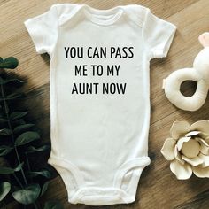 a baby bodysuit that says, you can pass me to my adult now