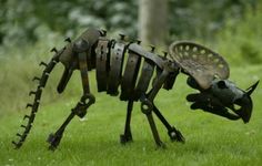 Quite frankly, it just doesn’t get any better than this: Recycled Tractor Rhinoceros Dinosaur Sculpture. By some genius named Mike Urban at Haute Nature. Really? swooning