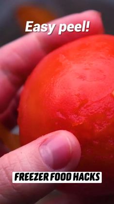 a hand holding an orange with the text easy peel freezer food hacks