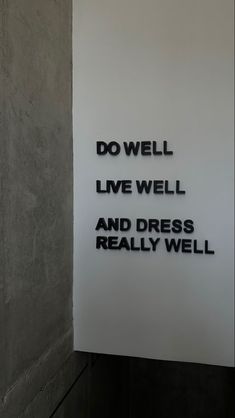 a sign that says do well live well and dress really well
