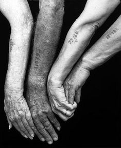 three hands holding each other with writing on them