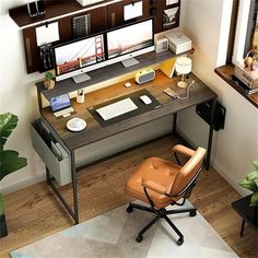 an office desk with two monitors and a chair in front of the desk is shown