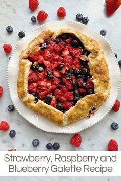 a strawberry, raspberry and blueberry galette recipe on a white plate
