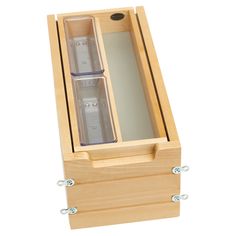 an empty wooden box with two glasses in it and the lid opened to show its reflection