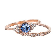 Add glamourous style to your look with this alluring rose gold tone ring set from LC Lauren Conrad, featuring a sparkling round blue simulated crystal and clear simulated crystal accents. Add glamourous style to your look with this alluring rose gold tone ring set from LC Lauren Conrad, featuring a sparkling round blue simulated crystal and clear simulated crystal accents. SET DETAILS Includes: 2 rings Width: 8 mm Metal: brass Plating: rose gold tone Finish: polished Material: acrylic, glass Nic Jewellery Rings, Lauren Conrad, Rose Gold, Lc Lauren Conrad, Gold Tone Ring, Womens Jewelry Rings, Jewelry Rings, Band Rings Women, Gold Jewelry