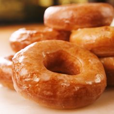You don't need super sharp culinary skills to make perfect yeast donuts at home—anyone can do it! What you do need is plenty of time, making them the perfect weekend baking project. If you want them for breakfast, wake up early and take a nap during each rise. Get the recipe at Delish.com. #delish #easy #recipe #donuts #doughnuts #glazed #homemade #fried #yeast #baking #dessert Glaze, Yeast Donuts, Donut Glaze, Yeast
