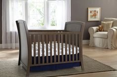 With gracefully curved ends the Kolcraft Elise 3 in 1 Crib brings a simple charm while giving an open feel. The modern slate finish makes this one of a kind piece stand out. #KolcraftNursery Bed