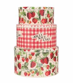 three boxes with strawberries on them and the words jolidce cake in red
