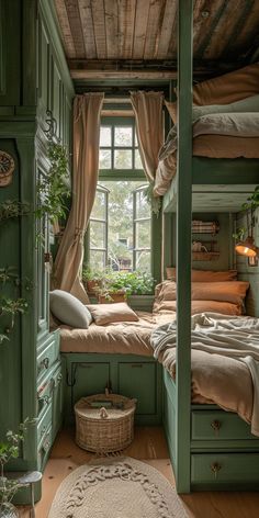 a bedroom with green painted walls and wooden flooring, built into the side of a house
