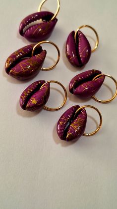Set of 6 painted cowrie shells on brass hair rings.  Rings can fit all locs and braids. Piercing, Bracelets, Bijoux, Funky Jewelry, Braid Jewelry, Dope Jewelry Accessories, Braided Ring, Dreadlock Jewelry, Braid Accessories