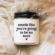 there is a jar that has some writing on it and the words smells like you're getting married