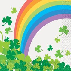 a rainbow and shamrocks are in front of a white background with a green leafed clover