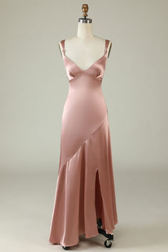 a pink dress on a mannequin dummy