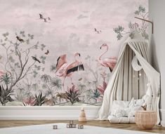 a bedroom with pink wallpaper and flamingos on the wall
