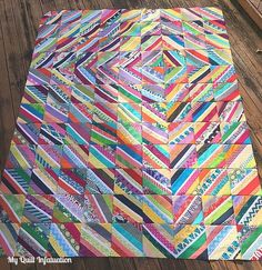 Happy Needle and Thread Thursday, y'all!  My latest quilt top is made from a scrap jar dive, and it's a doozie.  It's loud and wonky, and I ...