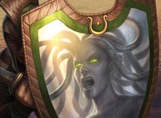 an image of a woman with green eyes holding a shield and looking at the camera