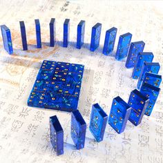 blue dices arranged in a circle on top of a table