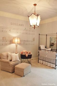 a baby's room with musical notes on the wall