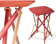 two wooden stools sitting next to each other