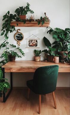 there is a desk with plants on it and the words boho workspace design ideas