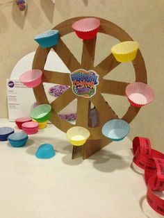 there is a spinning wheel made out of cupcakes