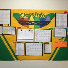 a bulletin board with several pieces of paper attached to it that are labeled class info