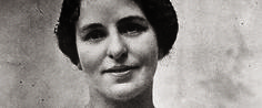 an old black and white photo of a woman