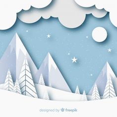 a paper cut landscape with trees and snow
