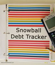 there is a snowball debt tracker next to a calculator