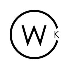 the letter w in a circle with black and white letters on it's side