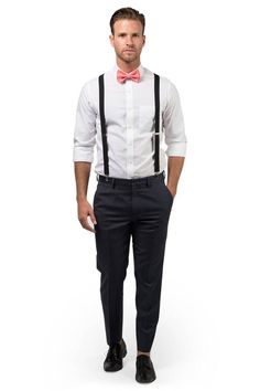 a man wearing a bow tie and suspenders