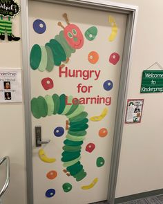 the very hungry for learning door is decorated with an image of the very hungry caterpillar