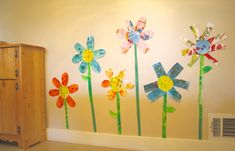 a room with flowers painted on the wall