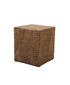 a square stool made out of wood with a snake skin pattern on the top and bottom