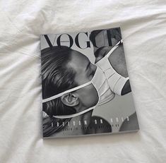 a magazine with an image of a man kissing a woman's face on the cover