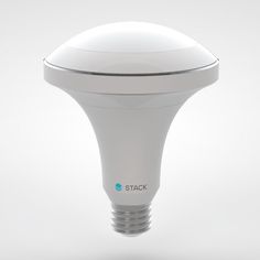 a white light bulb with the stac logo on it's side, in front of a gray background
