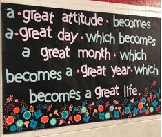 a sign on the side of a building that says, a great attitude becomes a great day which becomes a great month which becomes a great year which becomes