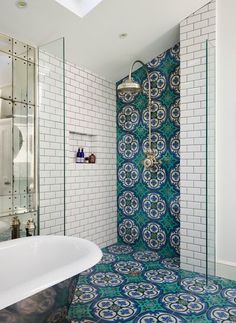 Stunning Victorian bathroom with white subway tile, beautiful Moroccan tiles along the floor and shower, stainless steel oversized shower head and a metallic freestanding tub | Drummonds Bathrooms Bathroom Interior, Tile Bathroom, Bathroom Design, Bathroom Design Trends, Small Bathroom, Bathroom Decor, Bathroom Inspiration
