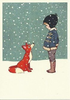 a little boy standing next to a fox in the snow