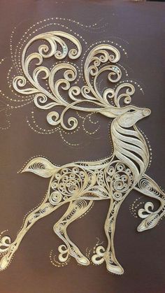 an intricately designed reindeer is shown on a brown background with swirls and dots