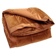 a brown blanket is folded up on top of each other with the sheets pulled down