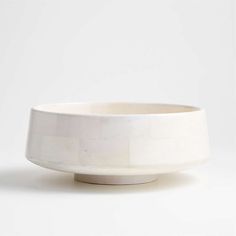 a white bowl sitting on top of a table