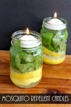 two mason jars filled with lemons and spinach