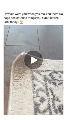 an image of a rug on the floor that has been cleaned and is being viewed by someone