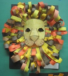 a lion mask made out of construction paper