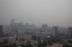 the city is covered in smoggy air pollution