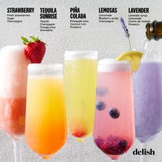 four different types of drinks are lined up on a table with the names of each beverage