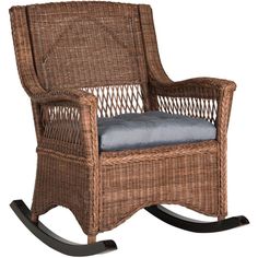 a wicker rocking chair with blue cushion